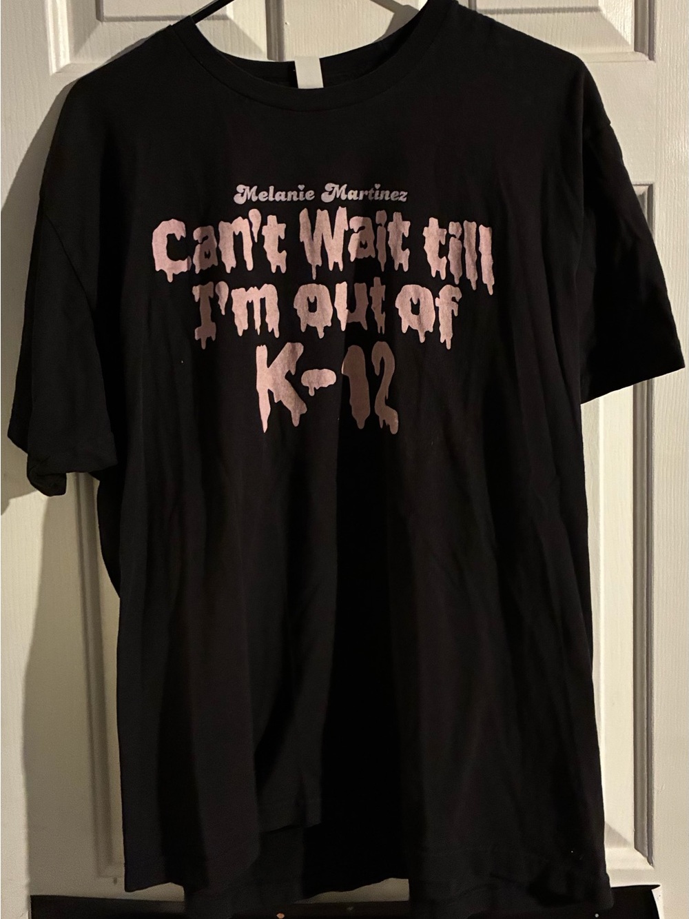 Melanie Martinez Black Short Sleeve Graphic Tee with Pink Lettering